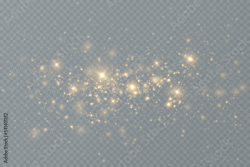 Golden sequins glow with many lights. Glittering dust. Luxurious background of golden particles.