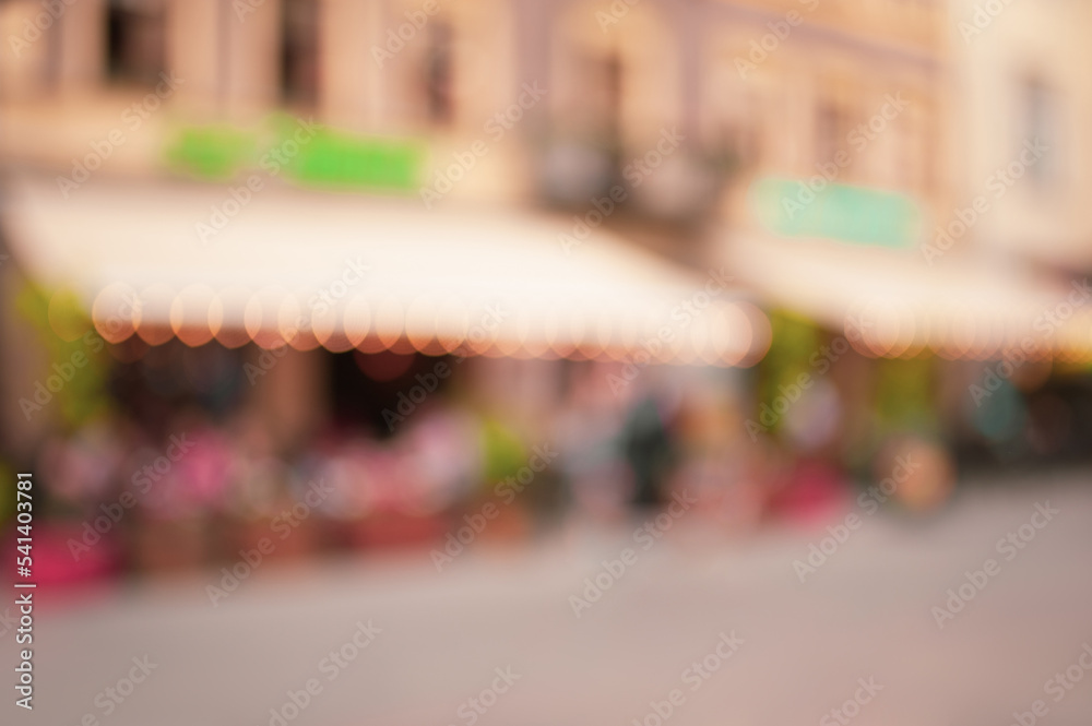 Blurred view of cafe with outdoor terrace