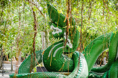 June 7th,2022 A green Naga statue  at Wat PA Klong11 ( Naga Temple ) in Pathum Thani city, Thailand