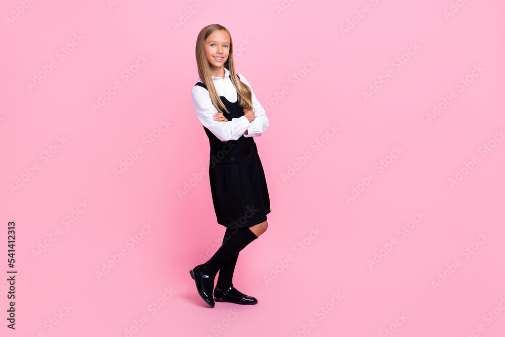 Full size photo of good mood diligent girl with straight hairdo dressed school uniform hands crossed isolated on pink color background Full size photo of good mood diligent girl with straight hairdo dressed school uniform hands crossed isolated on pink color background