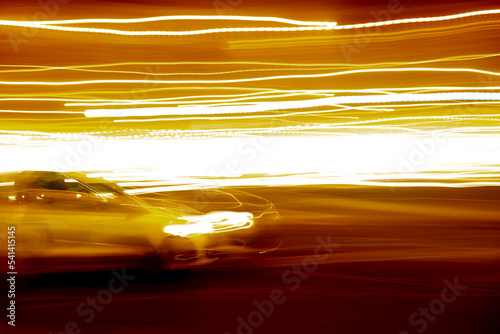 abstract background of moving car with trails of city light