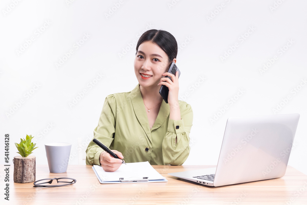 Business women who sit at their desks Business women who sit at their desks