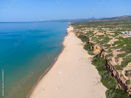 Top view with drone of the wild Scivu bay and the dune system of the wwf oasis, Costa Verde, Arbus, Sardinia photo