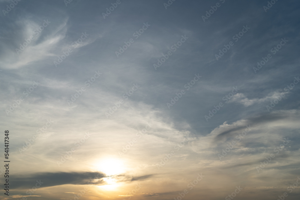 Beautiful ray of orange sun cloud blue sky nature sunset at horizon background.Yellow sunlight evening view twilight sky. Colorful tranquil scene idyllic reflection. Cloudscape wallpaper.