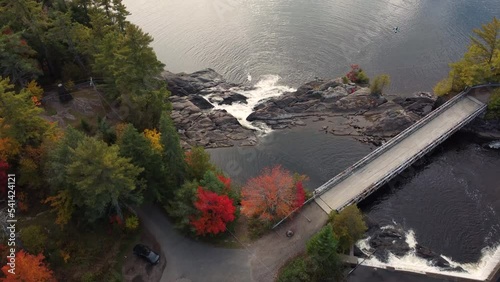 autumn aerial footage looking down on the falls from high falls in bracebridge in ontario canada photo