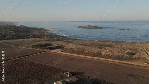 aerial footage of the atlantic ocean coast and small islands in portuguese alentejo photo