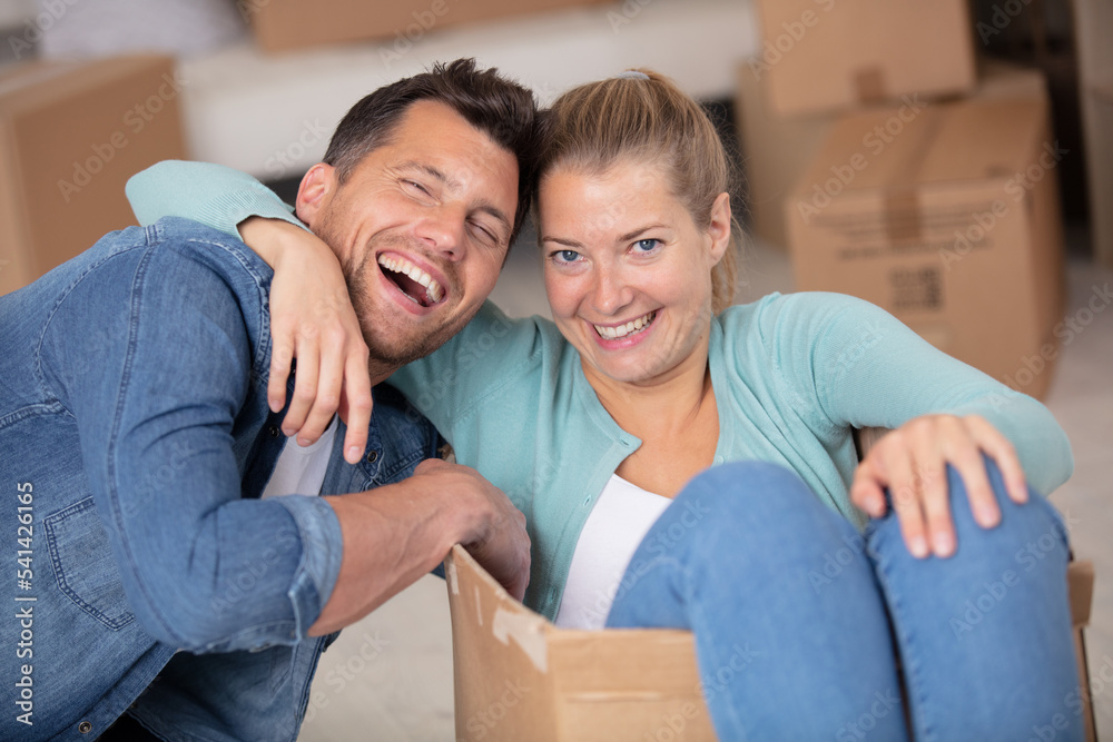 happy couple during moving house