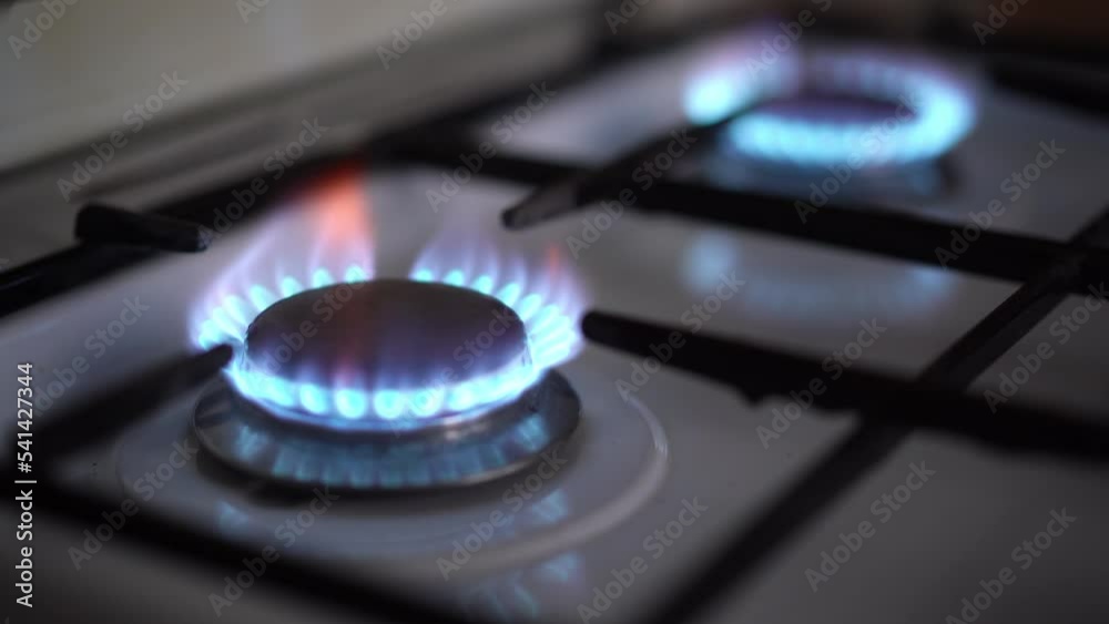 Turning on burning gas on the kitchen stove. Room heating Turning on burning gas on the kitchen stove. Room heating