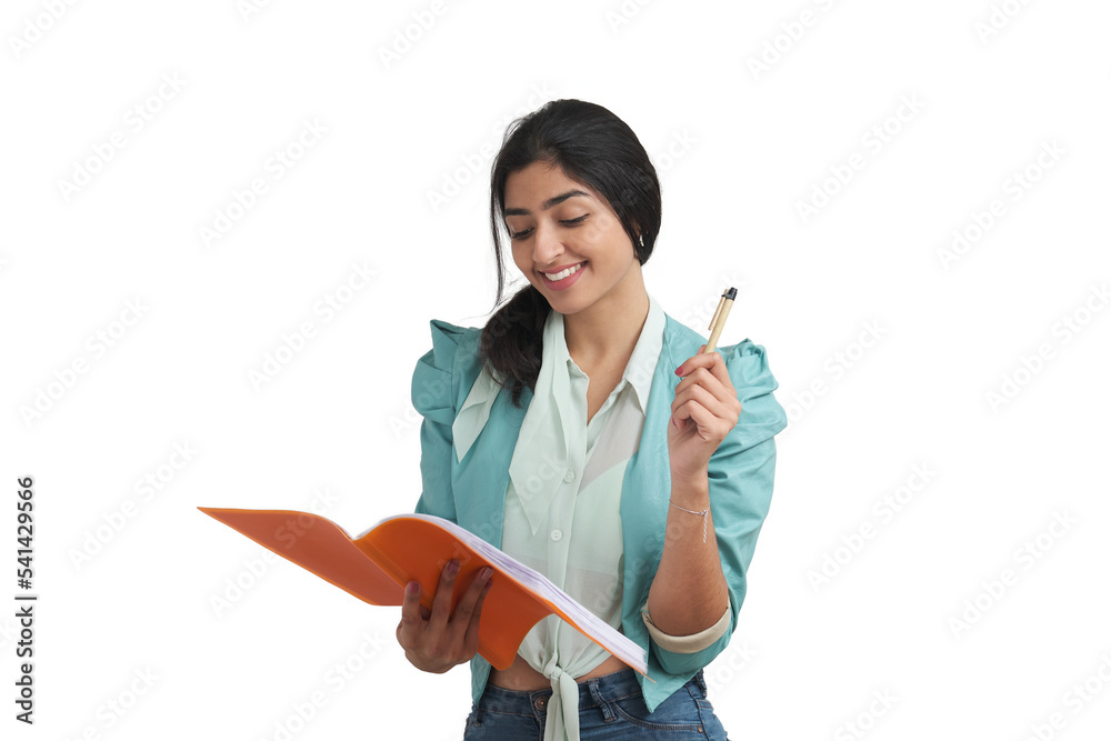 Young Venezuelan business woman having an idea with pen al folder. Isolated over white background. Young Venezuelan business woman having an idea with pen al folder. Isolated over white background.