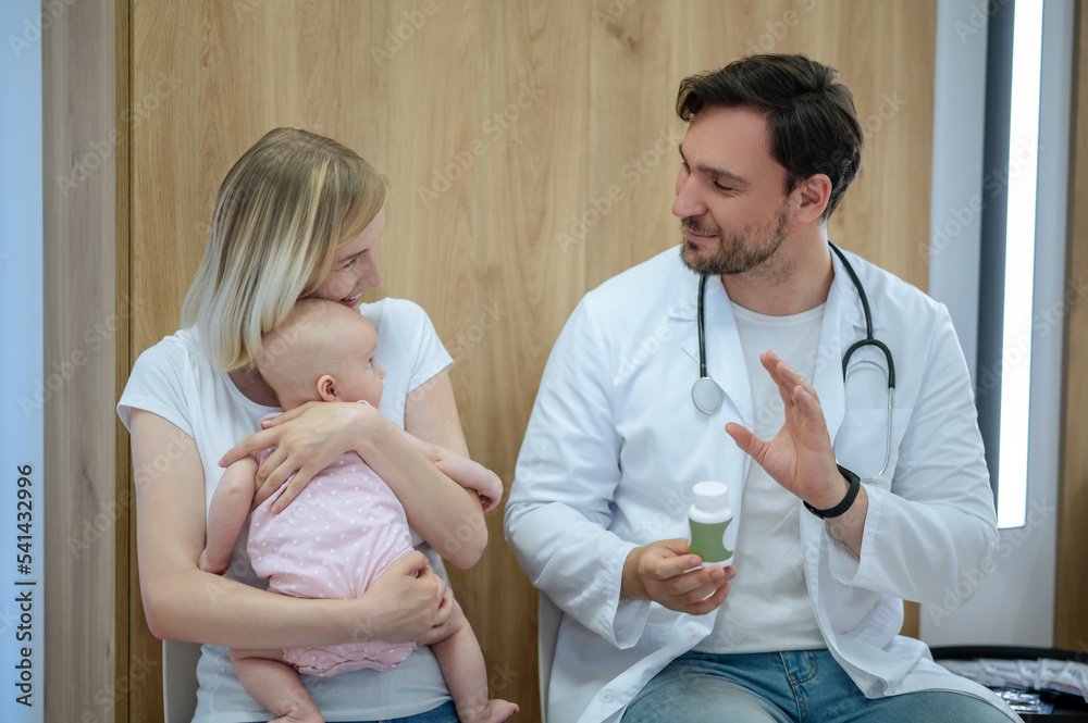 Female parent getting a medical consultation from a baby doctor