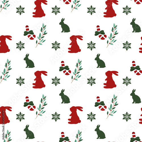 Seamless vector christmas pattern with snowflake elements, hare silhouette, ostrich branches, christmas candy. Design for printing on fabric and paper. photo