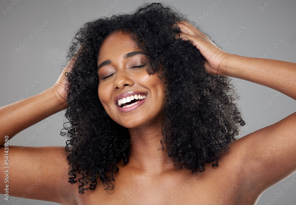 Hair care, black woman and with smile, confident and happy with curly