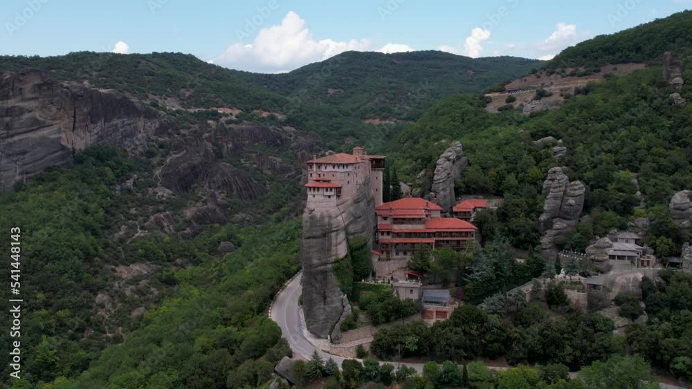 Aerial view of ancient monasteries on top of steep cliffs. Metheora, Greece. Drone shot of Magnificent work of human kind. Meteora temples Aerial view of ancient monasteries on top of steep cliffs. Metheora, Greece. Drone shot of Magnificent work of human kind. Meteora temples