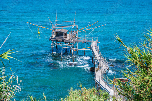 High angle view of the Trabocco Turchino with a clear blue sea photo