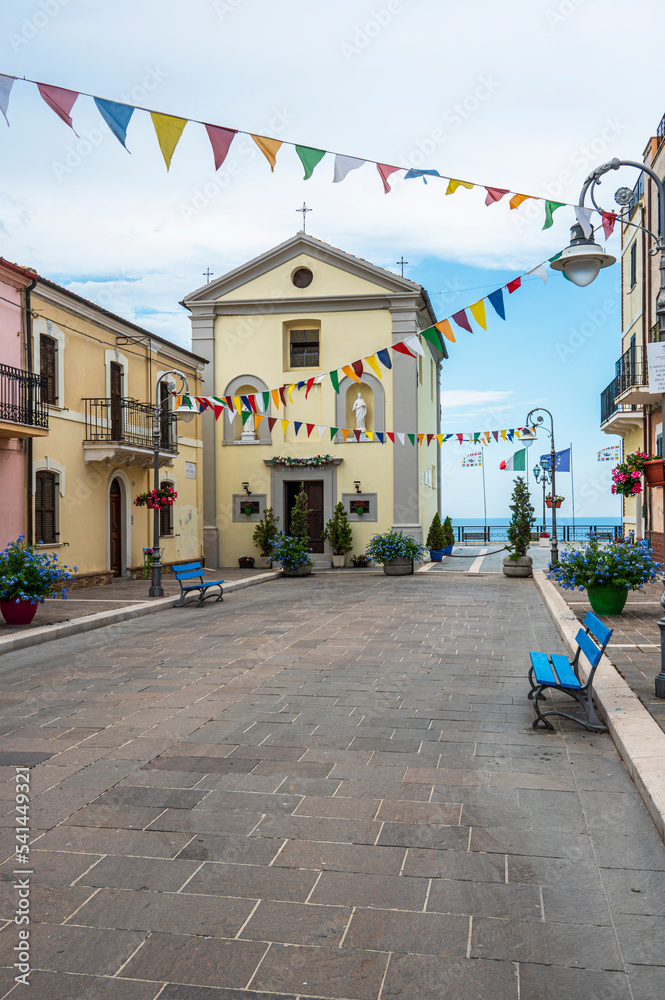 The beautiful main street of San VIto Chietino with colored flowers and facades