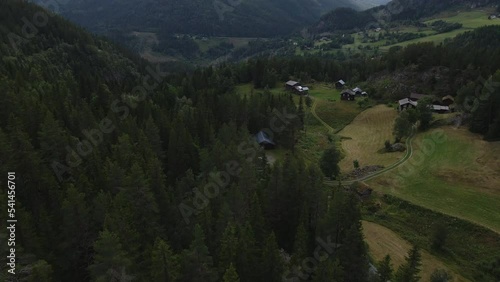 A panoramic view of a national park towards mountain ranges and hills covered by cold rain-forests photo