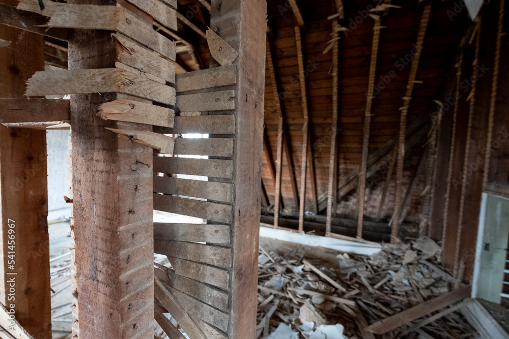 Fototapeta premium Building work underway in a suburban Edwardian house in Pinner, northwest London UK. The builder is taking the house back to brick.