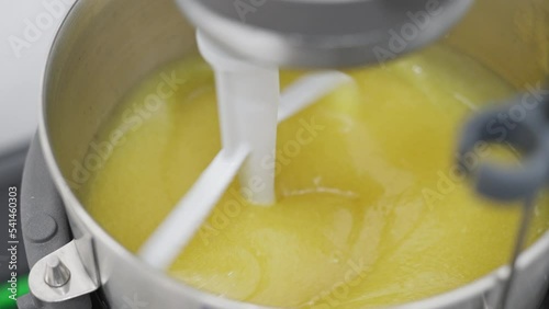 Making lubrication grease in the laboratory by using cooking machine to do saponification in the bowl. Batch trial and experiment. Lubrication grease and industrial, manufacturing concept