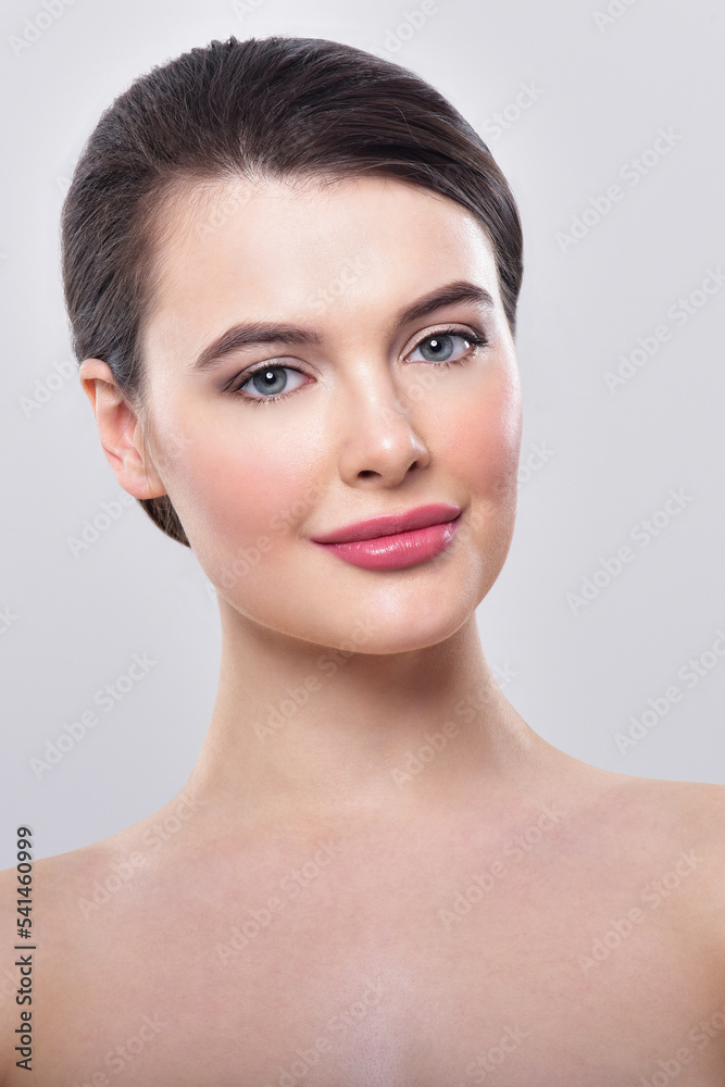 Beautiful face of young adult woman with clean fresh skin. Beautiful face of young adult woman with clean fresh skin.