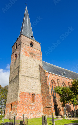 Tower of the historic Maartenskerk church in Kollum, Netherlands photo