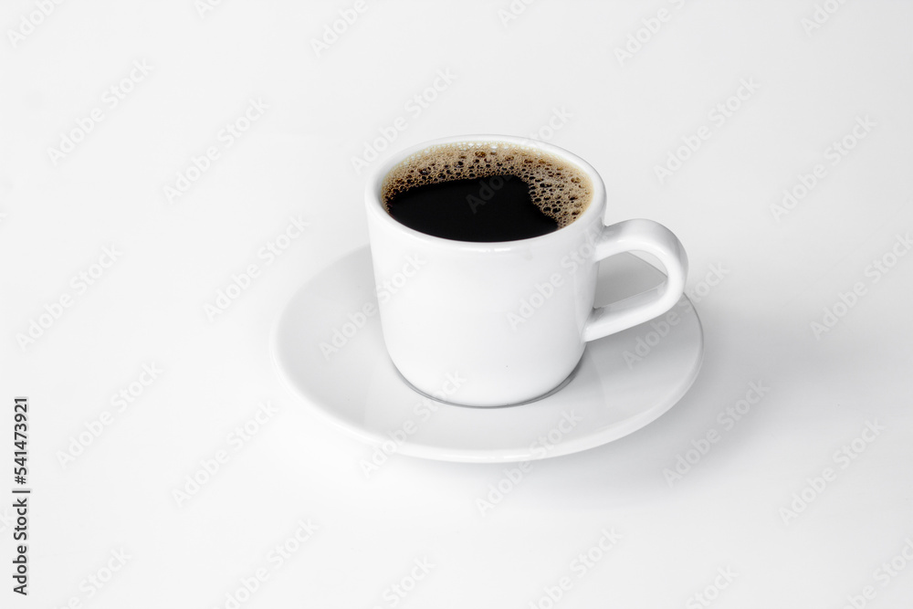 White cup of hot espresso coffee. Morning routine concept White cup of hot espresso coffee. Morning routine concept