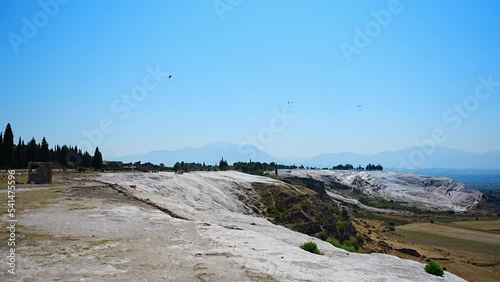 Calcite cliff of Pamukkale, white travertines in Turkey photo