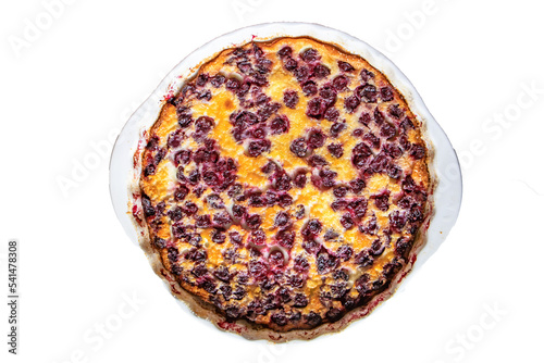 White round ceramic baking dish with freshly baked cherry pie CLAFUTI, top view. isolated on a white background photo