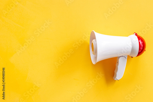 White loudspeaker for announcing hiring or advertising. Megaphone device
