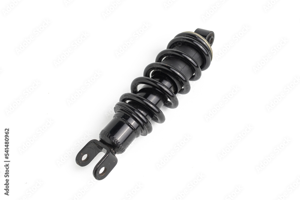 close up of black rear shock absorber for motorbike isolated on white background close up of black rear shock absorber for motorbike isolated on white background