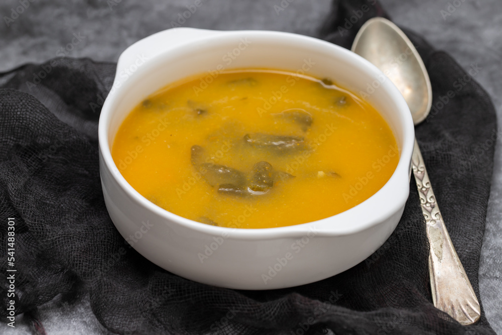 vegetable soup with crackers in white bowl on ceramic vegetable soup with crackers in white bowl on ceramic
