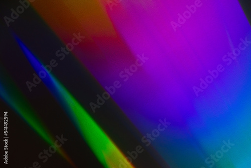 Colofrul holographic light pattern on the wall, abstract background © evannovostro