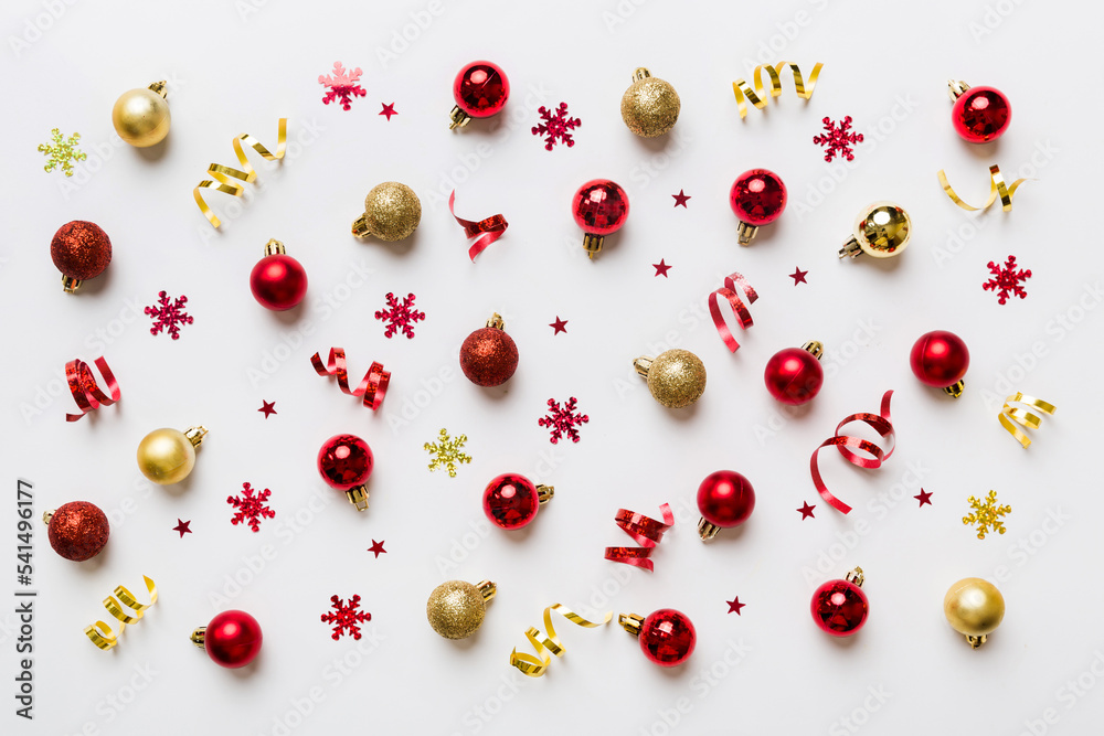 Christmas composition. a pattern of christmas balls on colored background. Flat lay, top view New year decor Christmas composition. a pattern of christmas balls on colored background. Flat lay, top view New year decor