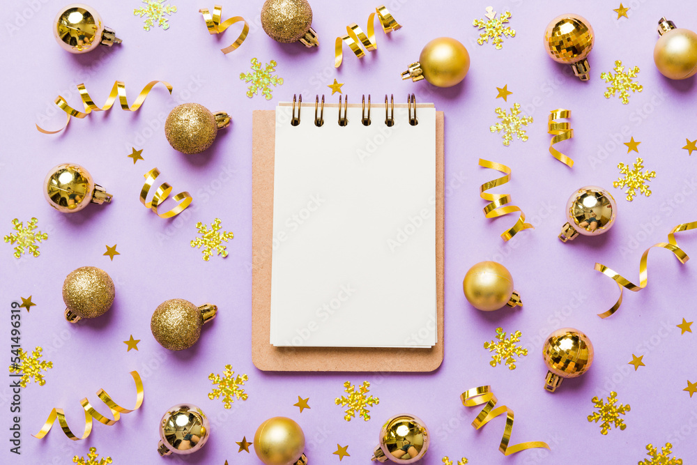 Fototapeta premium Christmas blank greeting card mock-up scene. Creative layout made of Christmas tree branches and paper card note. Flat lay. Nature New Year concept