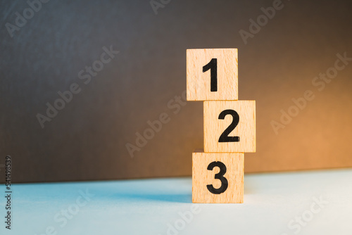 Wooden block number using as business competition concept