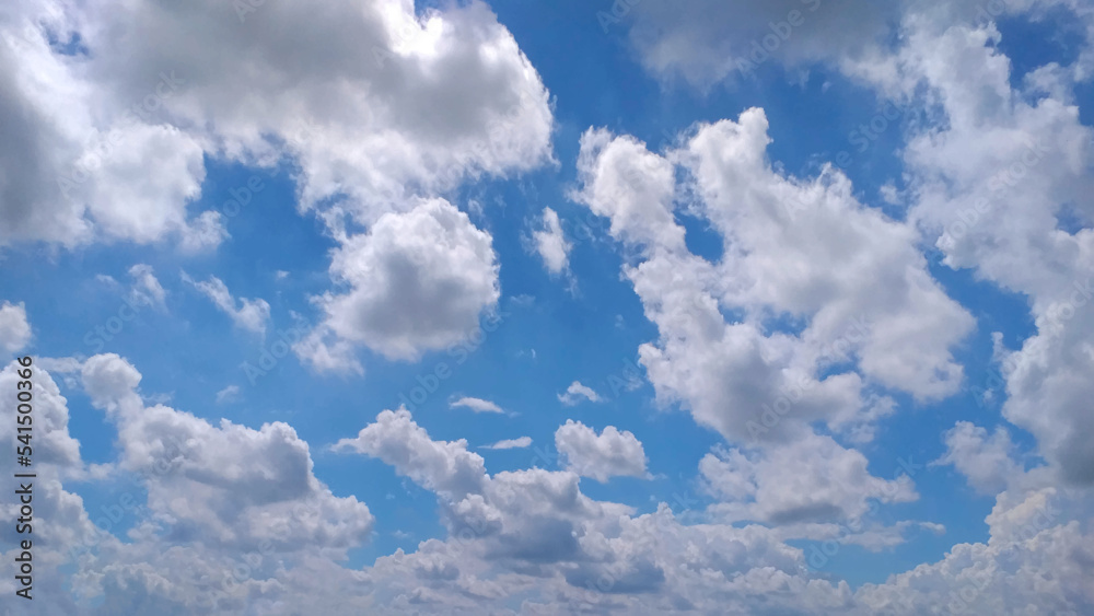 Blue sky and tiny white clouds background