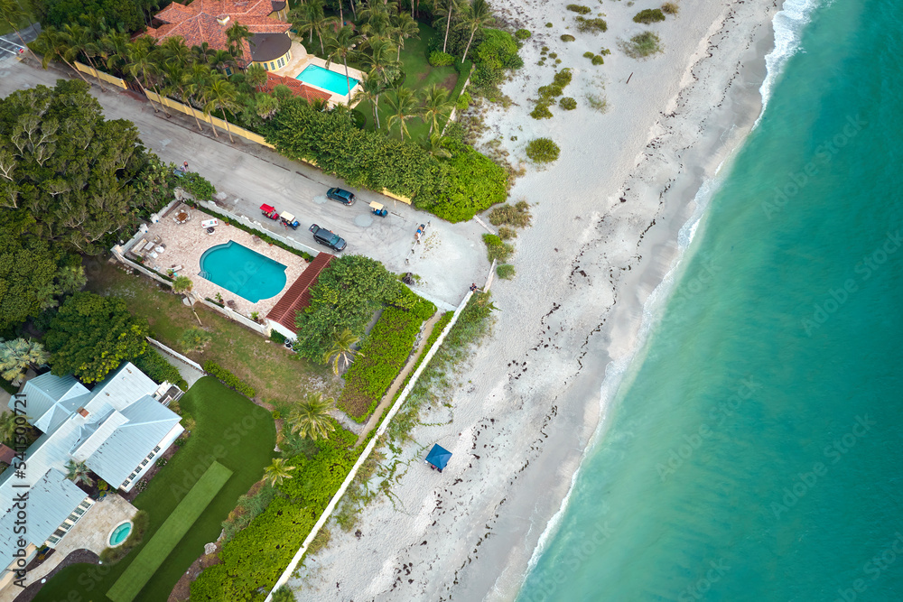 Aerial view of expensive residential houses in island small town Boca