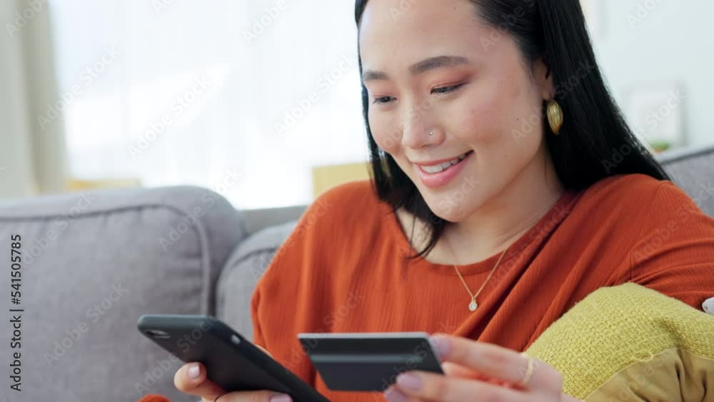 Online shopping, credit card and asian woman on sofa, smartphone payment and banking, ecommerce and fast food delivery in house. Customer, cellphone fintech and mobile cash money for internet finance Online shopping, credit card and asian woman on sofa, smartphone payment and banking, ecommerce and fast food delivery in house. Customer, cellphone fintech and mobile cash money for internet finance