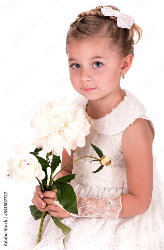 Happy little girl giving peony flowers on white background