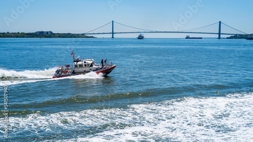 Coast Guard Boat and Verrazzano-Narrows Bridge in New York Harbor photo