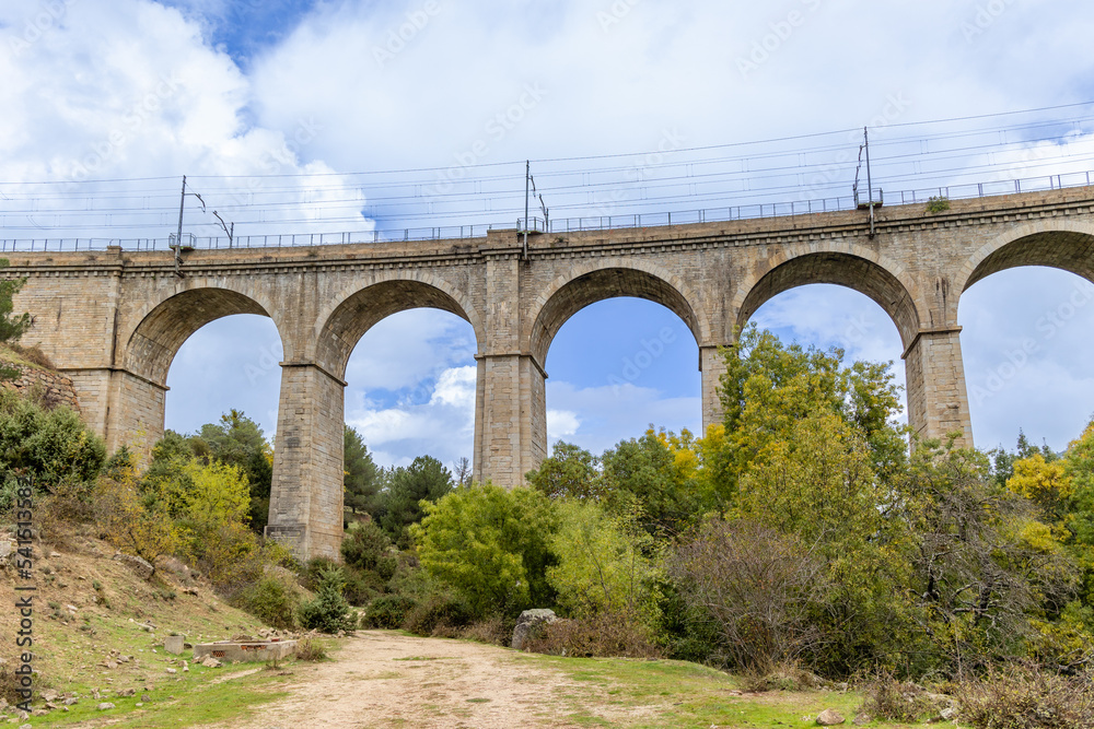 railway bridge that crosses the cofio river in the Sierra de Guadarrama, Madrid