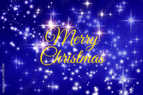 Merry Christmas wishes text on blue background with shining stars. Christmas season and celebration concept.