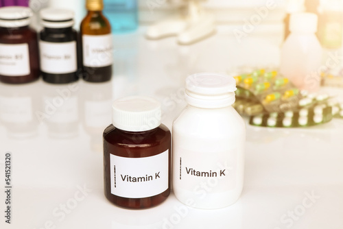 Vitamin K pills in a bottle, food supplement or used to treat disease