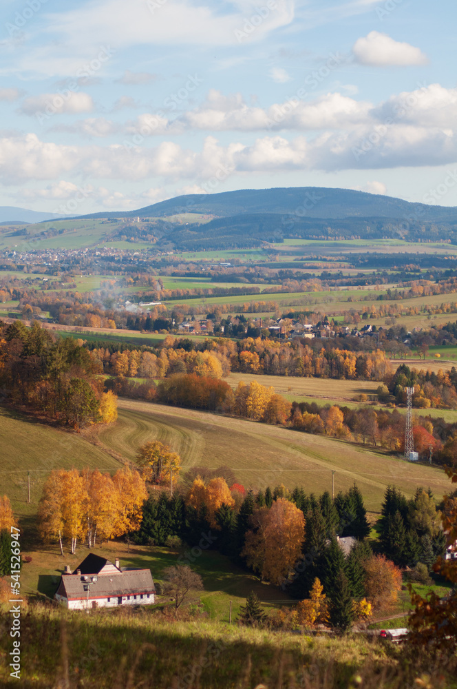 Fototapeta premium beautiful autumn landscape. view from the mountain to the green fields, trees. tranquility and nature