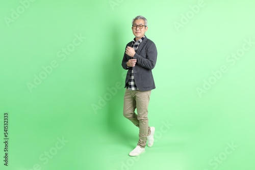 Asian Man on Green
