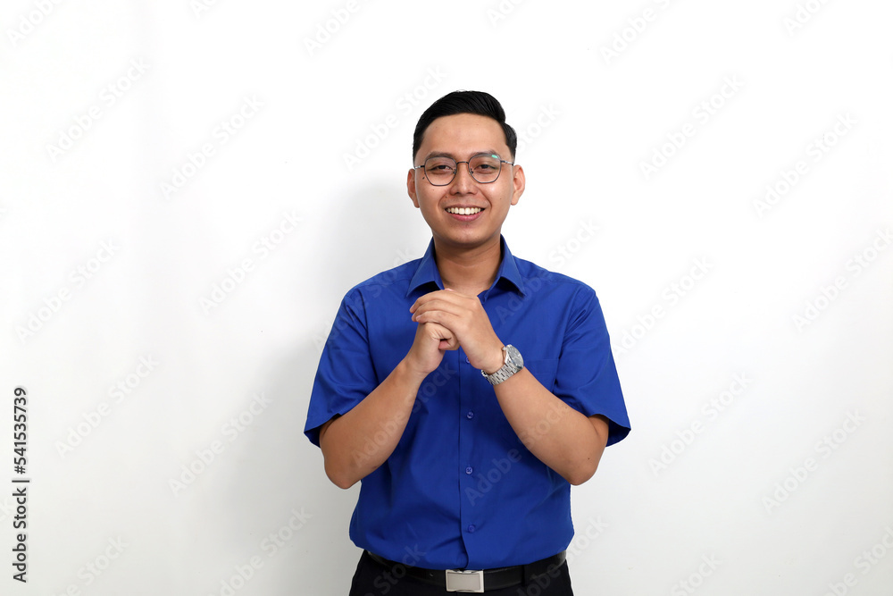 Confident young asian man standing while looking at the camera. Isolated on white background Confident young asian man standing while looking at the camera. Isolated on white background