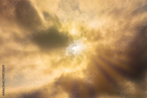 sunbeams through the clouded sky. spiritual concept