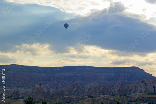 beautiful view of valley with ballons in cappadocia, turkey 