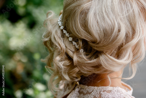 accessories and decoration in the bride wedding hairstyle. Style and fashion