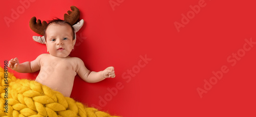 Cute little baby with deer ...