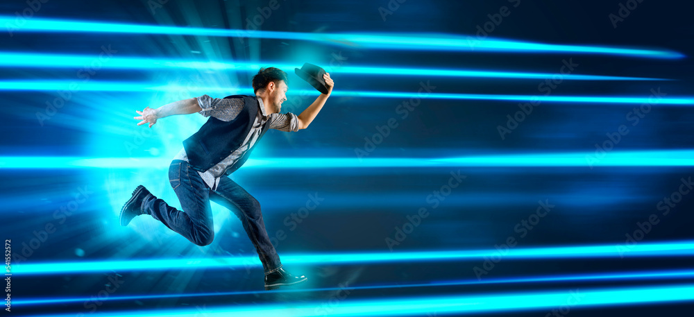 Man with black hat dancing on blue neon background